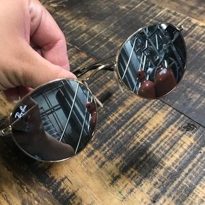 Ray Bans: mirrored with round lenses